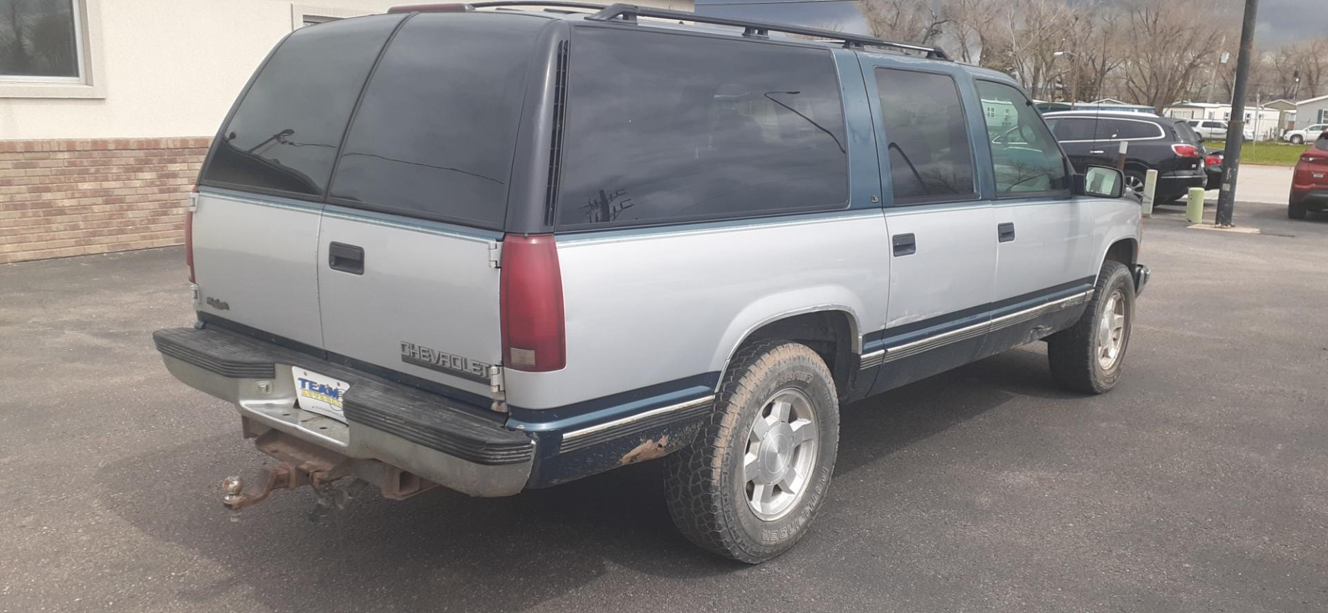 1995 Chevrolet Suburban K1500 4WD (1GNFK16K8SJ) with an 5.7L V8 OHV 16V engine, 4-Speed Automatic Overdrive transmission, located at 2015 Cambell Street, Rapid City, SD, 57701, (605) 342-8326, 44.066433, -103.191772 - CARFAX AVAILABLE - Photo#3